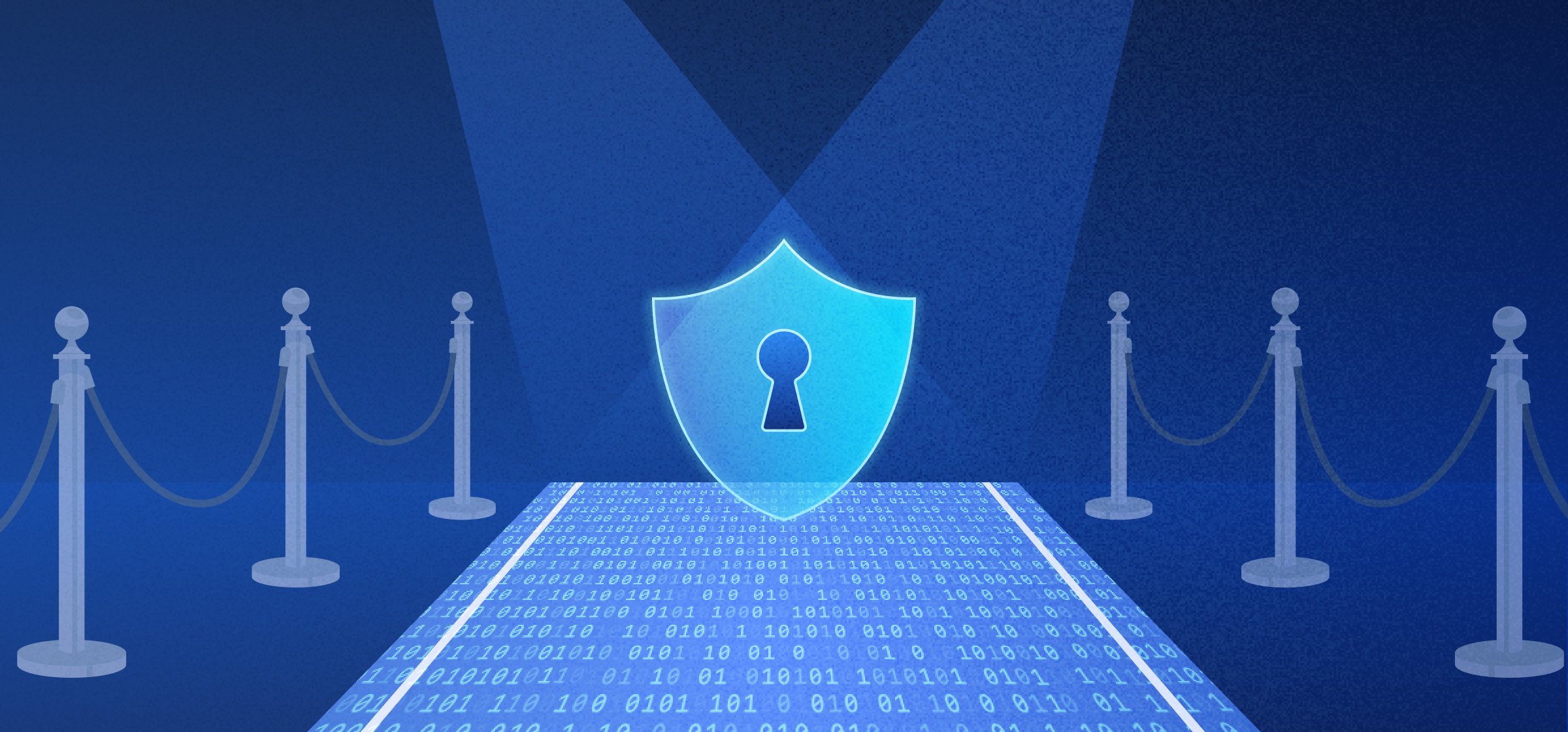 A blue carpet with stanchions along its side, as a shield-shaped lock sits at the end lit with a spotlight